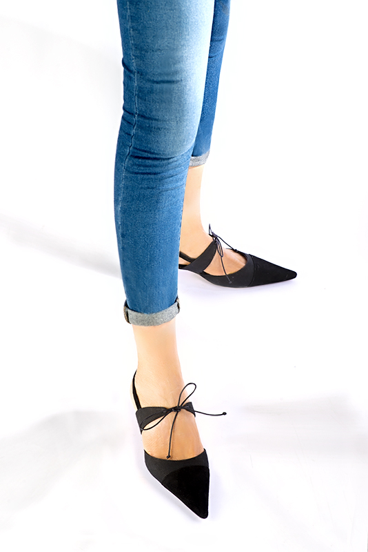 Navy blue women's open back shoes, with an instep strap. Pointed toe. Low comma heels. Worn view - Florence KOOIJMAN